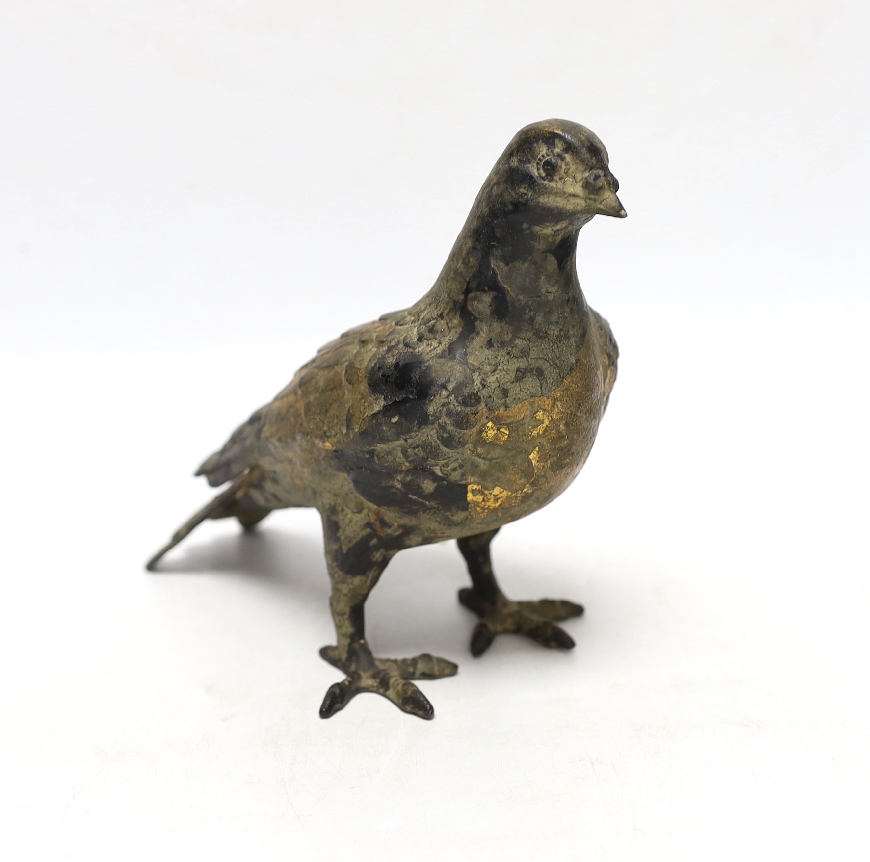 A gilt cast iron model of a pigeon, 16.5cm